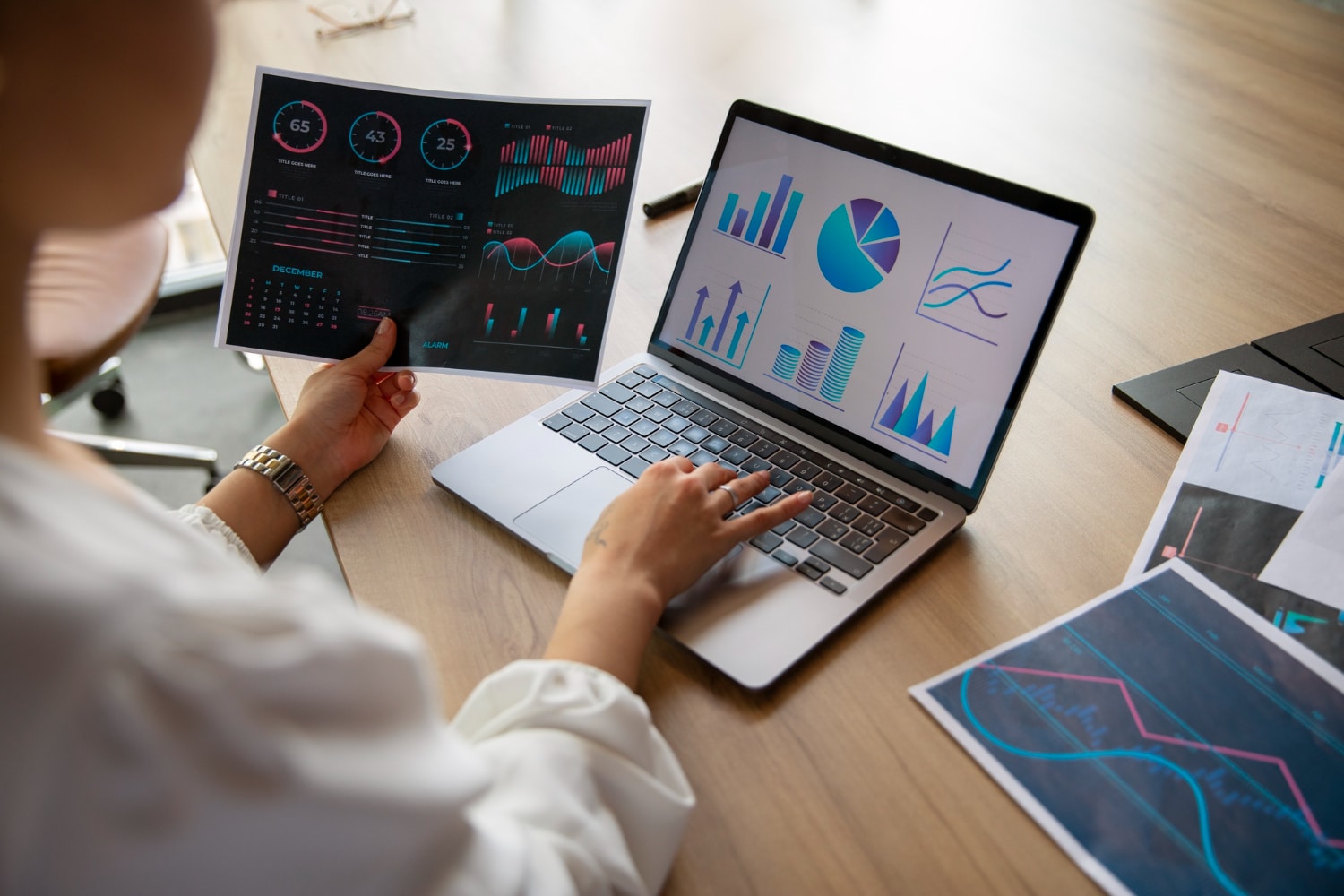 office-workers-using-finance-graphs